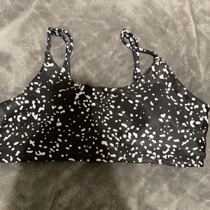 black bikini top with white spots